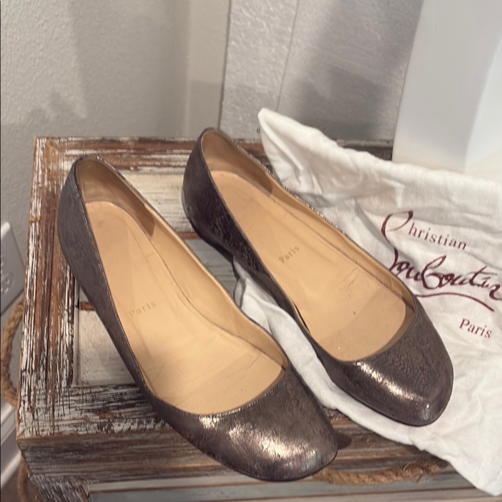 Christian Louboutin Silver Flats Elegant Design